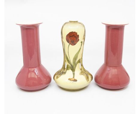 A pair of early 20th Century Ault Pottery vases, pink ground, along with a Continental Art Nouveau vase (3)