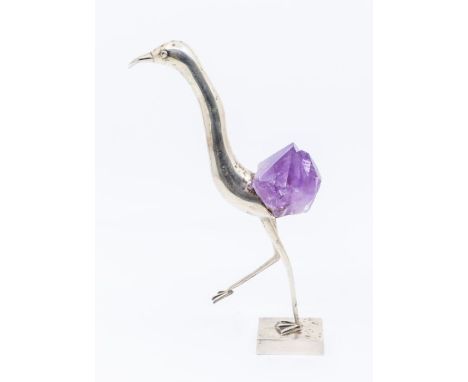 A Brazilian 900 standard silver and amethyst quartz mounted model of a stork like bird, the base stamped Grupo Gal, 4806, 900