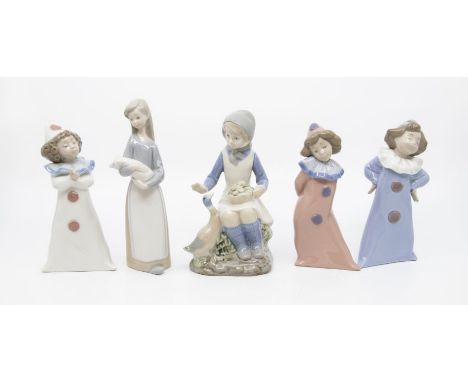 Lladro figure of a girl with three Nao figures and another Spanish made figure