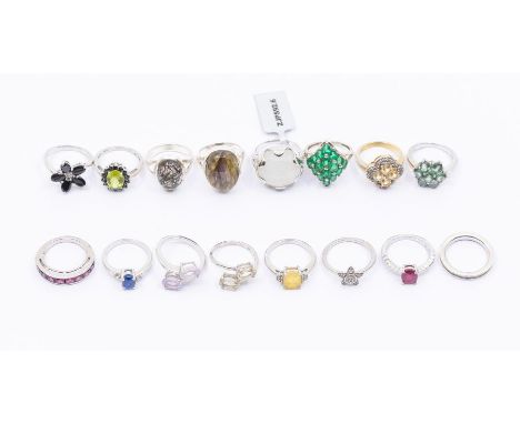 A collection of sixteen Gems TV gem set silver rings to include, a peridot and black spinel cluster, a labradorite oval ring 