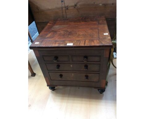 A Victorian rose mahogany commode with dummy drawers