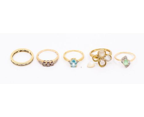 a collection of Gems TV 9ct gold dress rings to include a cubic zirconia half eternity ring, emerald and diamond ring, blue t