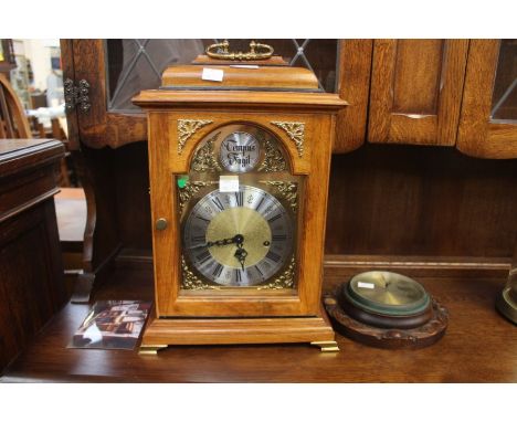 20th Century German Tempus Fugit mantle clock with four glass panels in mahogany, silvered dial, roman numerals, along with e