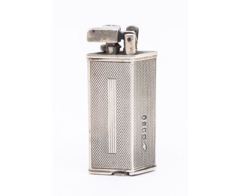 An Art Deco silver cased Parker Beacon diamond shaped lighter, stamped to base with Registration Design no: 799038, the engin