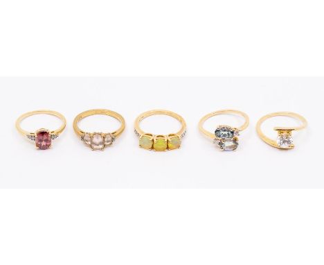 A collection of five Gems TV 9ct gold and gem set rings to include a Ethiopian three stone opal and white zircon ring, sizeL1