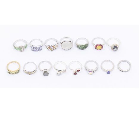 A collection of fifteen Gems TV silver and gem set dress rings, to include a multicolored sapphire channel set ring, a tanzan