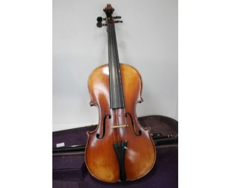 A Violin Labelled Stradivarius early 20th century, four strings, in working order, complete with bow and carrying case.Condit