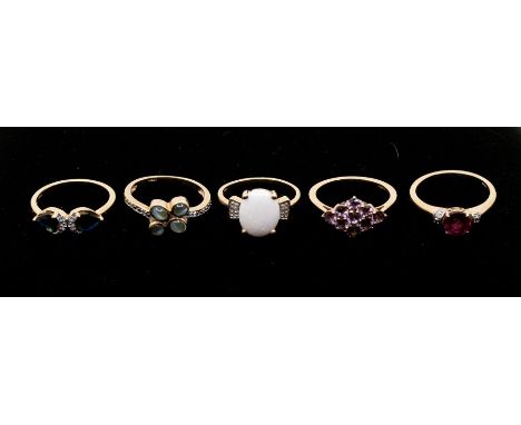 A collection of five Gems TV 9ct gold and gem set rings to include a two stone sapphire and diamond ring, sizeL1/2, a cats ey