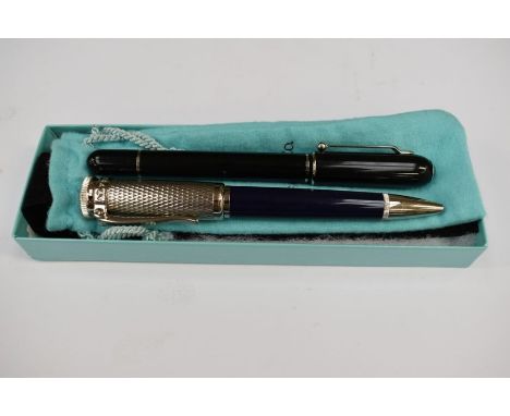 A Tiffany &amp; Co silver pen; an Alfred Dunhill pen; and another (3)