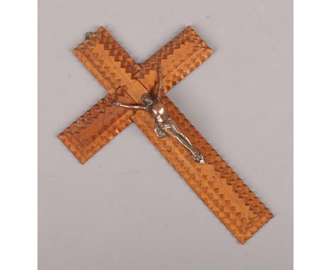 A tramp art crucifix surmounted by a figure of Christ, 20cm.  