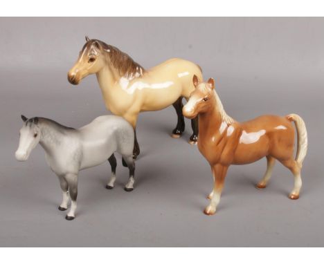 Beswick Highland Mackionneach Dun pony, approx 18 cm, Beswick Dapple Grey ceramic horse approx 13.5 cm to include one other s