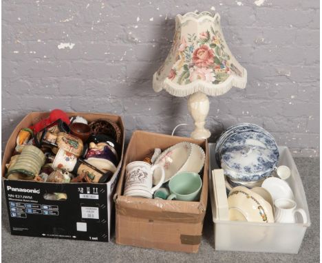 Three boxes of miscellaneous to include onyx table lamp, blue and white ceramics, character jugs, dinnerwares etc.  