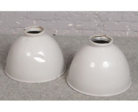 A pair of vintage industrial enamelled aluminium light shades, 46 diameter, 33cm high.  