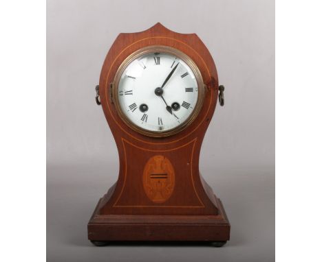 An Edwardian inlaid mahogany balloon mantel clock. With 8 day German cylinder movement by Haas and Soehne striking on a gong,