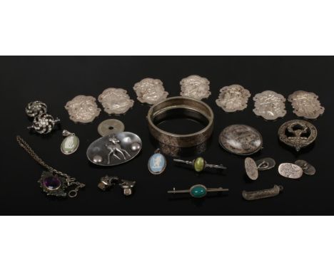 A tray of white metal and silver items including connemara brooch, Wedgwood pendants, bangle and belt panels etc.  