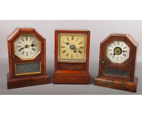 A 19th century walnut and boulle inlaid alarm clock, a Seth Thomas rosewood cased alarm clock and a mantel clock in parcel gi