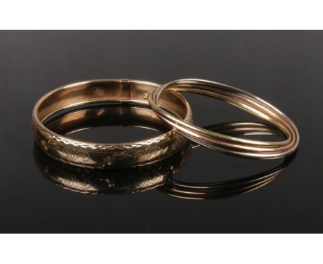 A rose, yellow and white 9ct gold bangle along with another 9ct gold bangle. Combined weight 20 grams.  