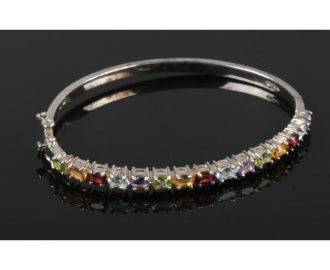 A silver semi precious bangle  