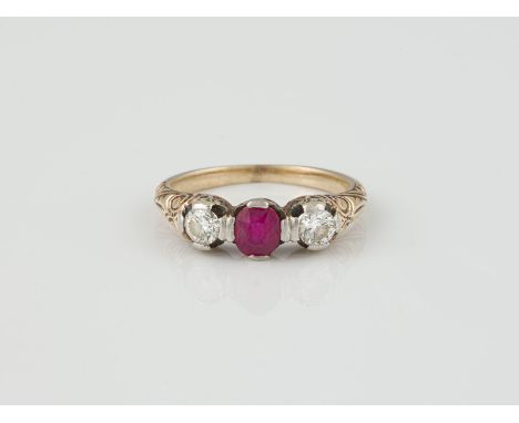 RING Gelbgold, Weißgold. Ringmaß ca. 50, Ges.-Gew. ca. 3,7 g. Gest. 585. Ein oval facettierter Rubin, ca. 0,40 ct., zwei Bril