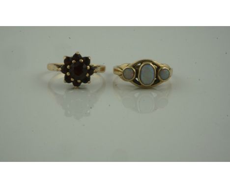 9ct Gold Opal Three Stone Ring, set with three graduated opals, stamped 375, also with a 9ct gold garnet cluster ring, stampe