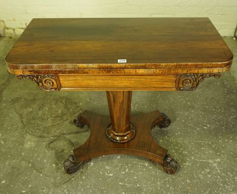 William IV Rosewood Card Table, Having a swivel fold over top, enclosing a felt lined interior, raised on a tapered column an