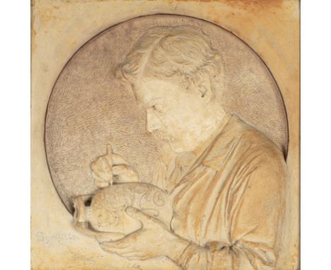 Robert Wallace Martin (British 1843-1923), a pottery relief portrait of Edwin Martin, circa 1885, the potter shown incising a