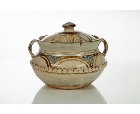 Michael Cardew (British 1901-1983), a stoneware casserole and cover with twin handles and thumb impressed band, blue and brow