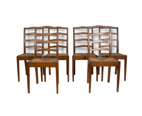 Peter Evans, a set of six Cotswold School dining chairs, the chamfered ladder backs with double notch design, fitted rush sea