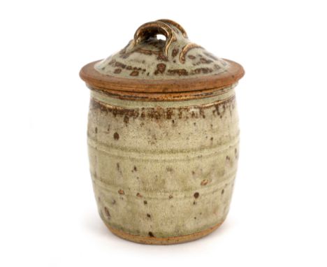 Richard Batterham (British, born 1936), a lidded jar with ash glaze and ribbed detail, painted mark 179 to underside/Provenan
