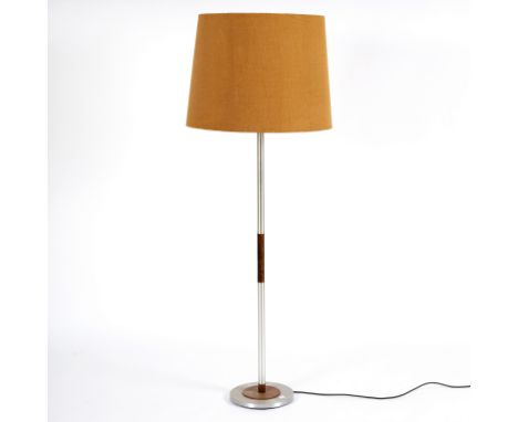 Danish mid-20th Century, a standard lamp in stainless steel and rosewood on circular foot, 148cm high including shade/Note: C