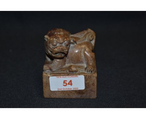 A Chinese soap stone seal carved with a Dog of Fo and seal mark to base or matrix