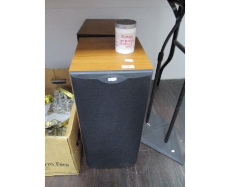 A pair of Bower and Wilkins DM602 speakers , and two speaker stands