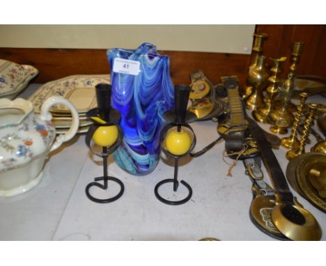 A pair of small wrought iron candlesticks together with a Mdina blue glass vase 