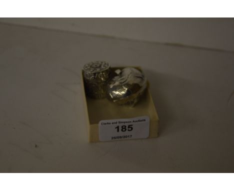 A white metal shell snuff box; together with a silver thimble case 