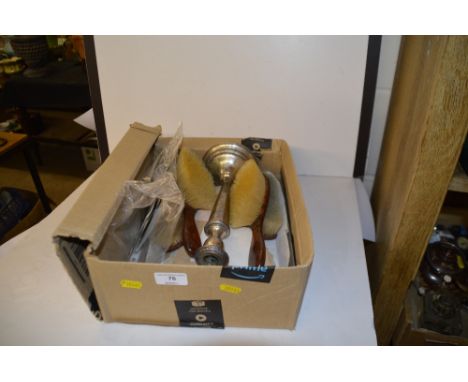 A box containing a silver candlestick, various dressing table items etc.