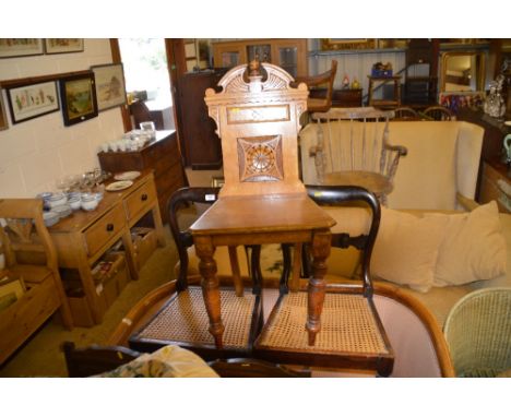 A Victorian light oak hall chair
