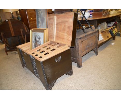 An oriental carved camphor wood trunk 