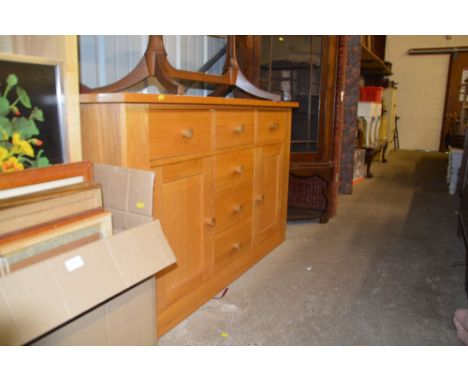 A light oak sideboard fitted six drawers