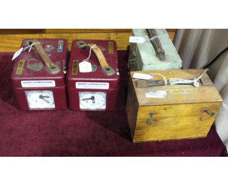Two Skymaster Ghost Bakelite cased pigeon timer clocks in cases and two STB pigeon timer clocks, (4).