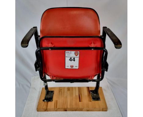 A Highbury Arsenal FC Folding Directors Chair. Purchased at the famous Highbury ground auction in 2006, this red chair has a 