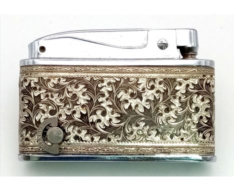 A novelty, vintage, PRINCE MUSELITE, musical lighter, produced by SANKYO in 1950’s Japan. Wonderfulengraving on sides. Excell