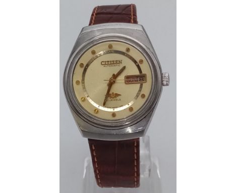 A Lovely Vintage Citizen Automatic Gents watch. Brown leather strap with gilded dial. Day and date window. In working order. 