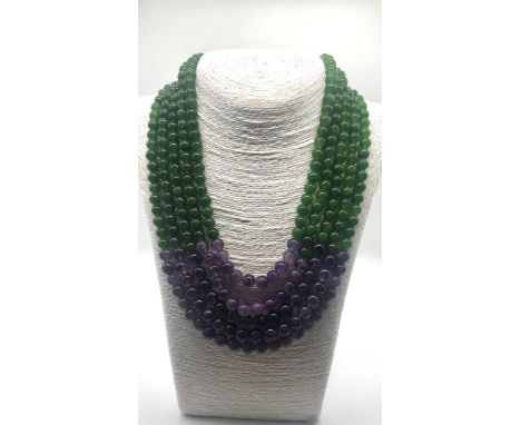A Statement Amethyst and Jade Beaded Five-Strand Necklace. 42-50cm. 6-8mm beads. Double triangle clasp. 
