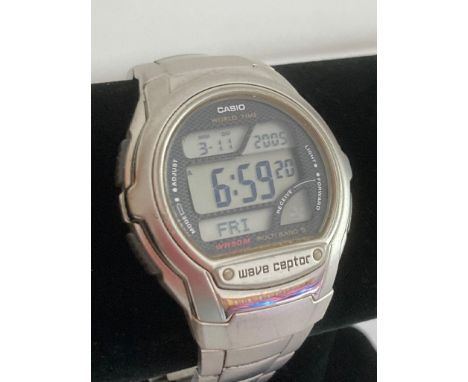 CASIO WAVE CEPTOR Multi function digital wristwatch in full working order. Silver tone with stainless steel bracelet. Excelle