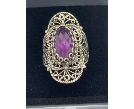 Stunning vintage  SILVER and AMETHYST RING , having large faceted AMETHYST gemstone set to top with intricate SILVER  filigre