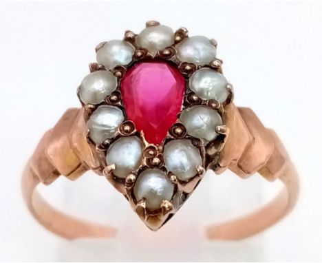 A VINTAGE 14K ROSE GOLD SEED PEARL AND PINK RUBY PEAR SHAPED RING.  2.3gms  size P 