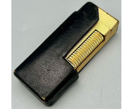 A Vintage Dunhill Gold Plated Lighter. Needs a flint, gas and a good clean - apart from that, all good. A/F.