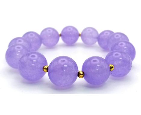 A Lavender Jade Beaded Expandable Bracelet. Gilded spacers. 