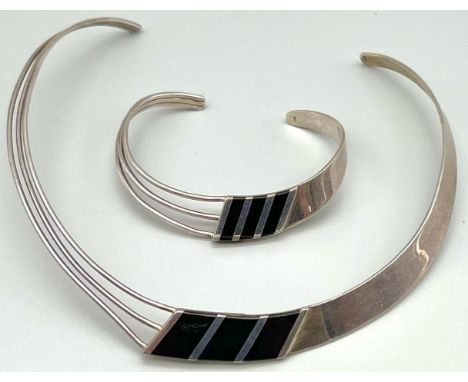 A Classy 925 Silver and Black Enamel Choker/Collar Necklace and Bracelet Set. Comes in a presentation case57.5g total weight.