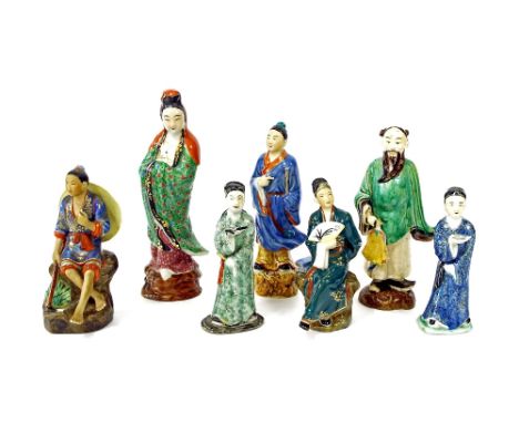Chinese pottery figure of a standing sage with green glaze gown, 9" high (a.f); together with six further ceramic Oriental fi